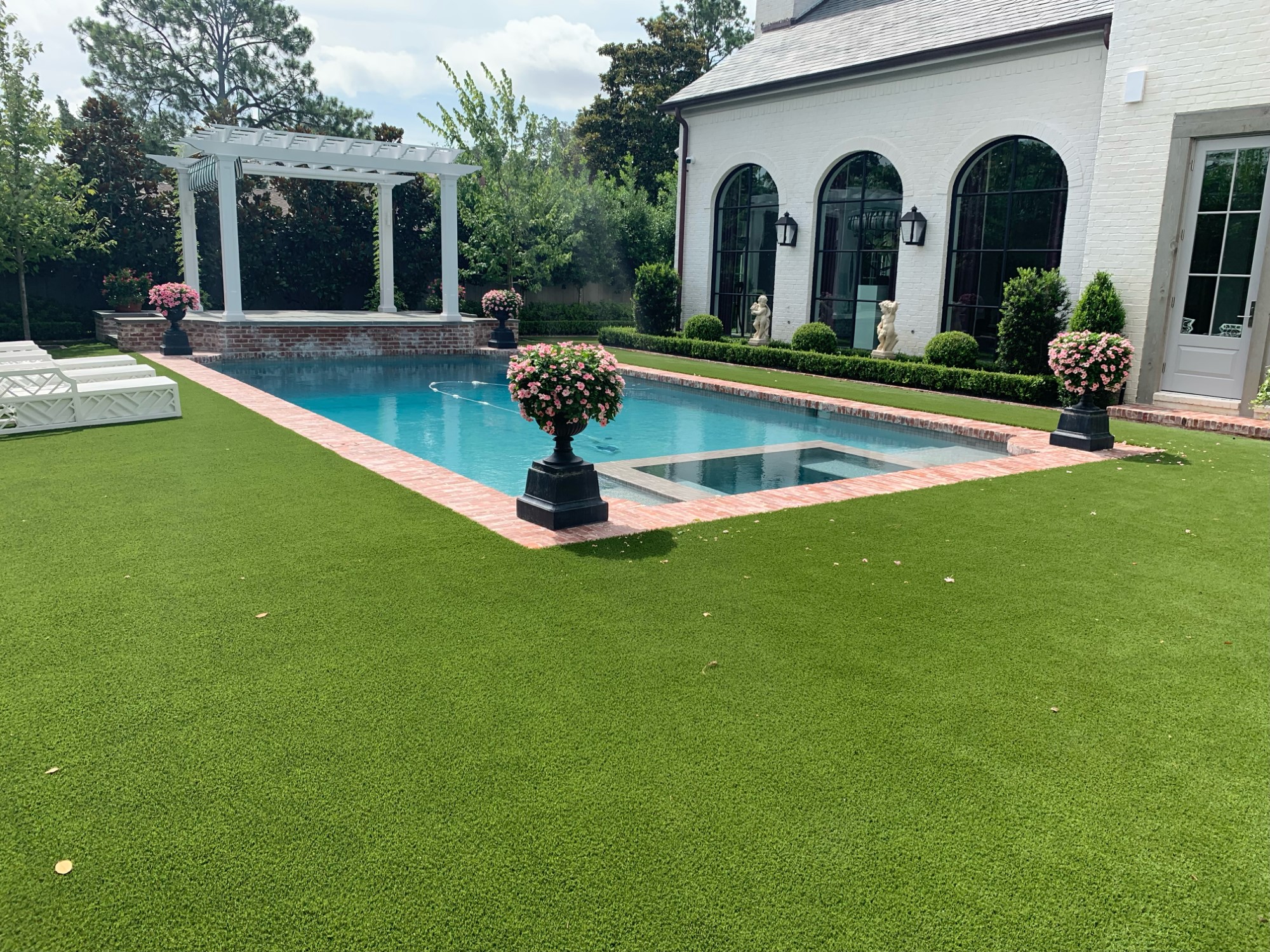 residential artificial grass lawn poolside