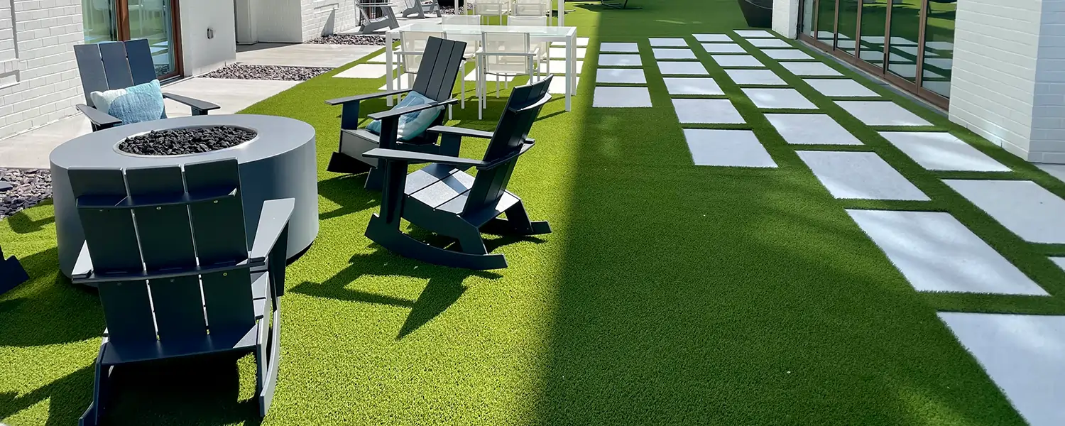 artificial grass lawn installation, fire pit with chairs