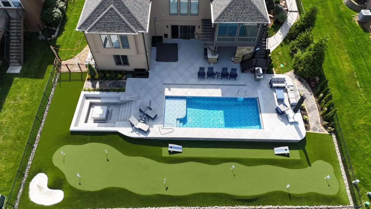 residential putting green poolside