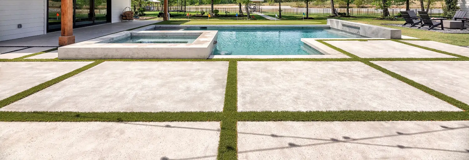 Backyard artificial grass pool area installed by SYNLawn